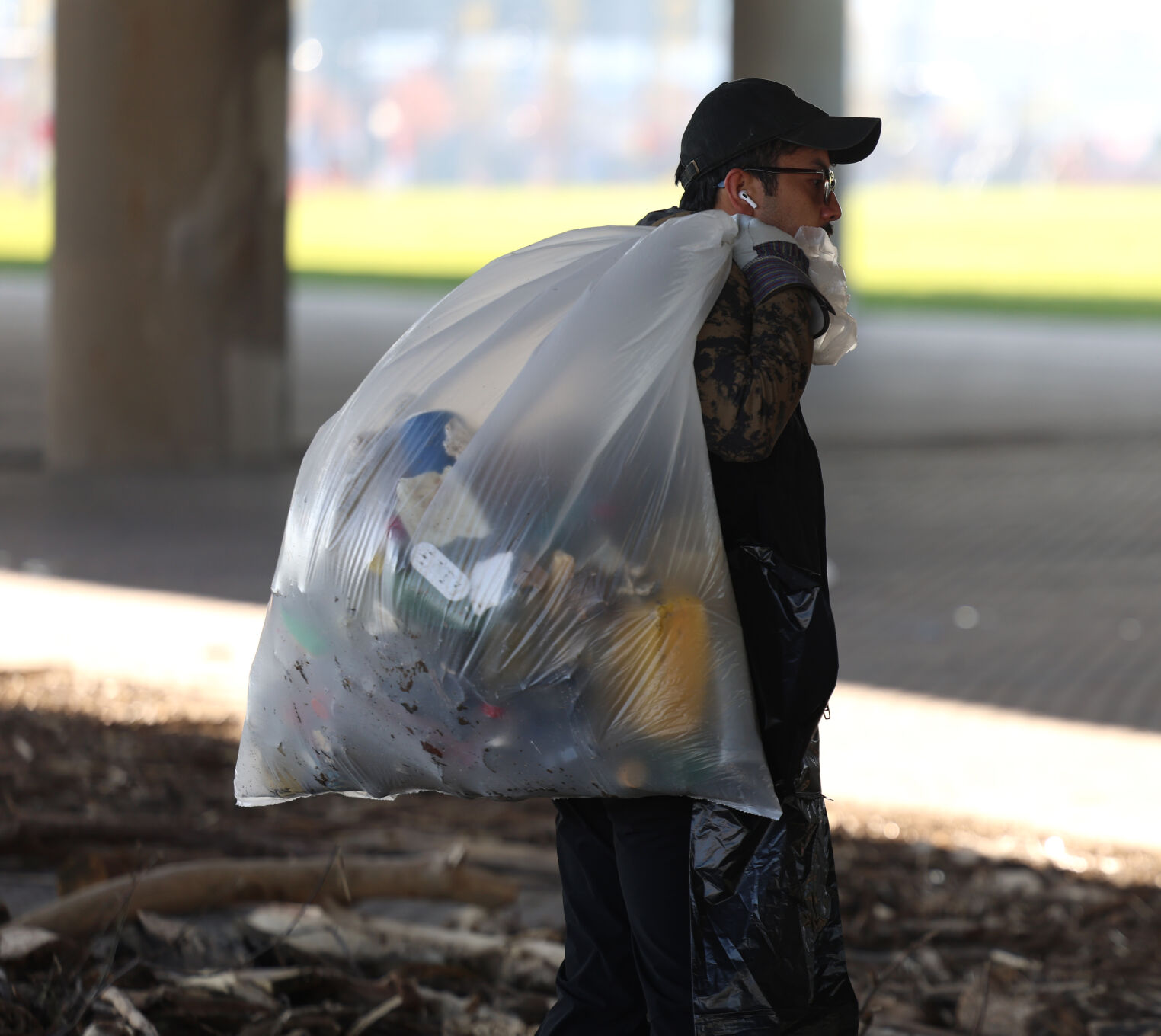 Man carries bag at Waterfront Park